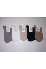 Женские носки высокие с узором косы